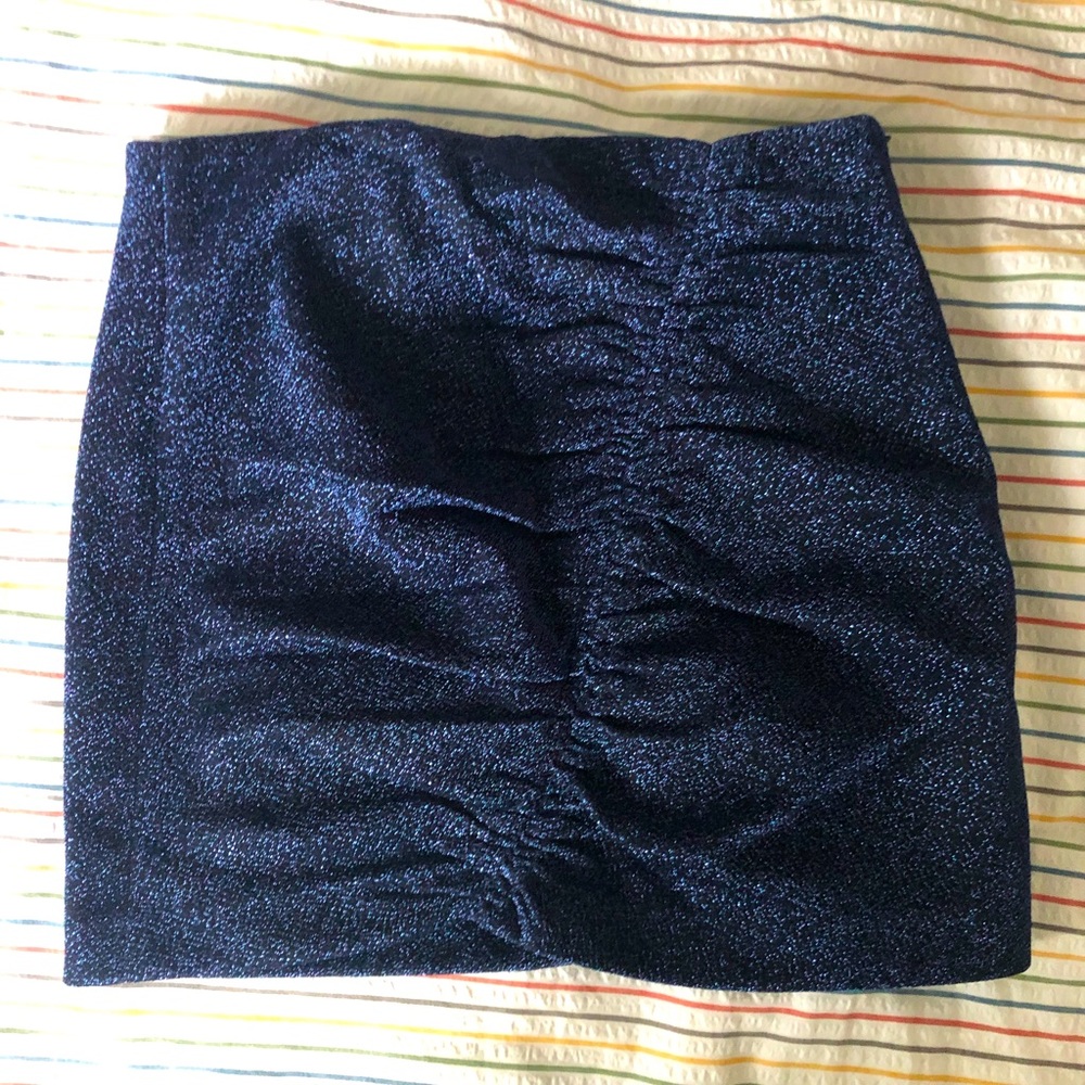 Mini skirt with blue glitters